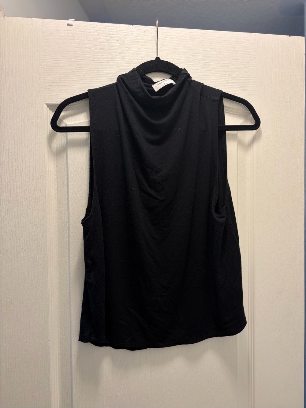 Bahrain Sleeveless Black Mock Neck Top medium